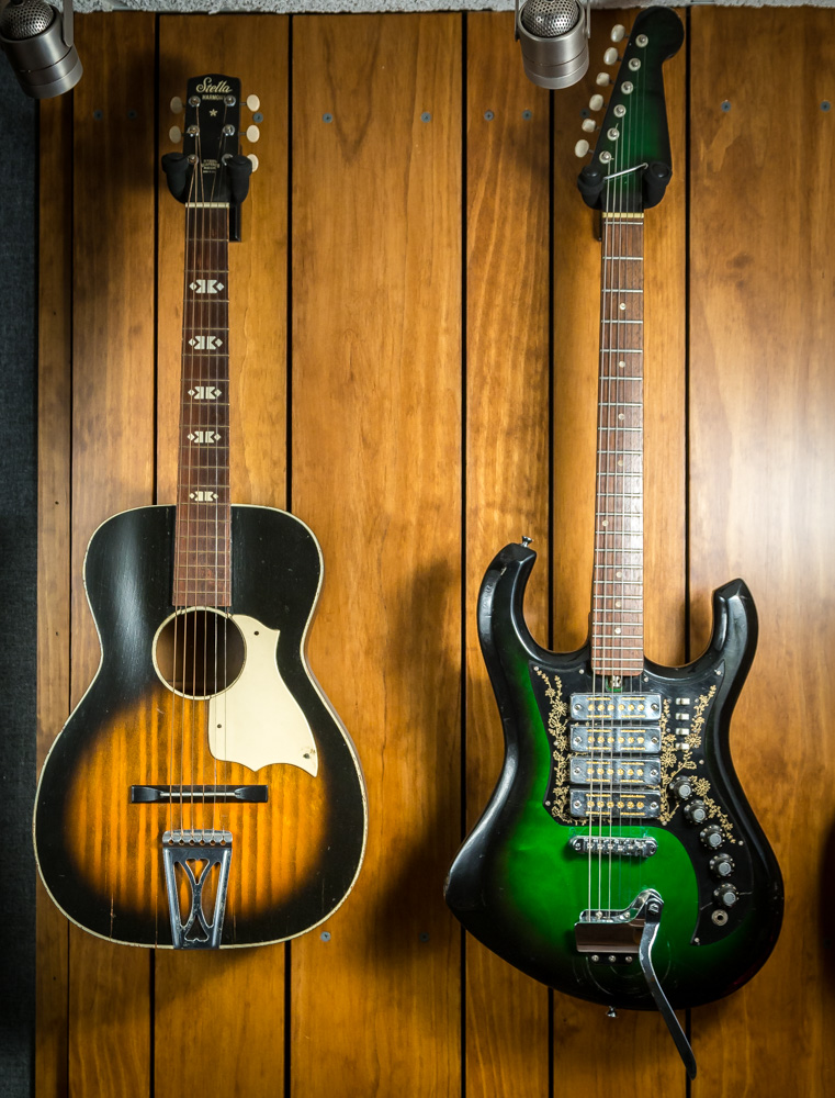 One favored guitar (R) he bought and sold decades ago, then tracked down and bought back.
