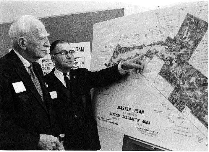 C.S. Mott and Parks Commission Board Chairman, Carl Ammerman, review the first Master Plan of the Genesee Recreation Area in 1968.